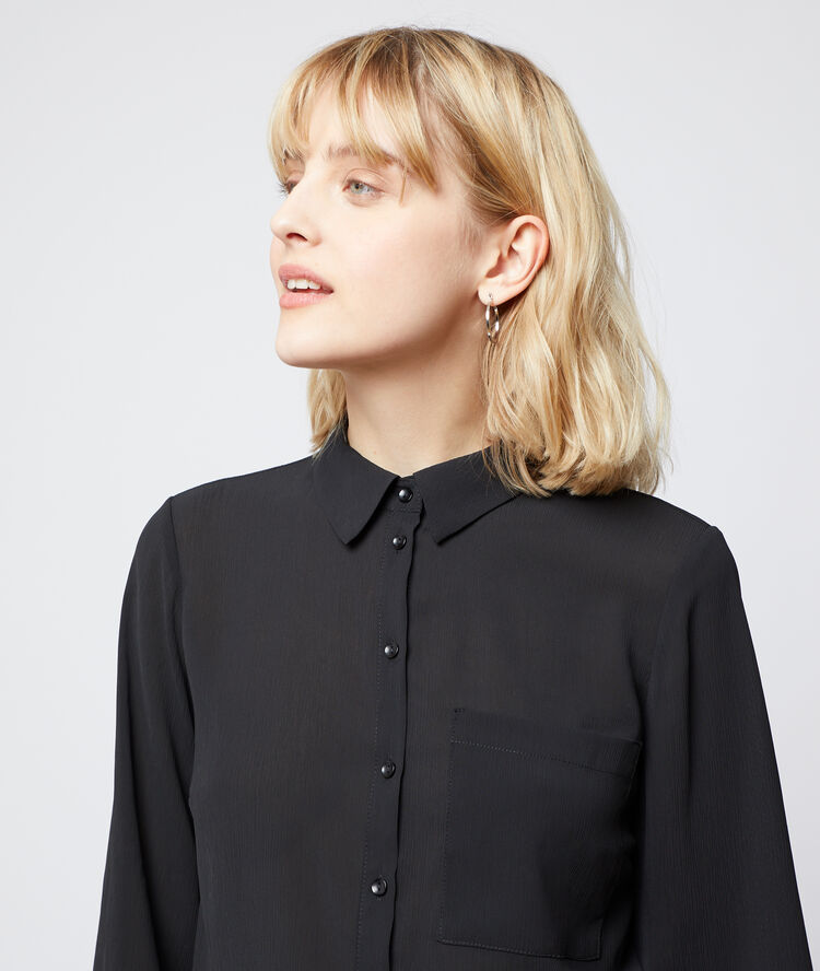 Chemise unie noir.