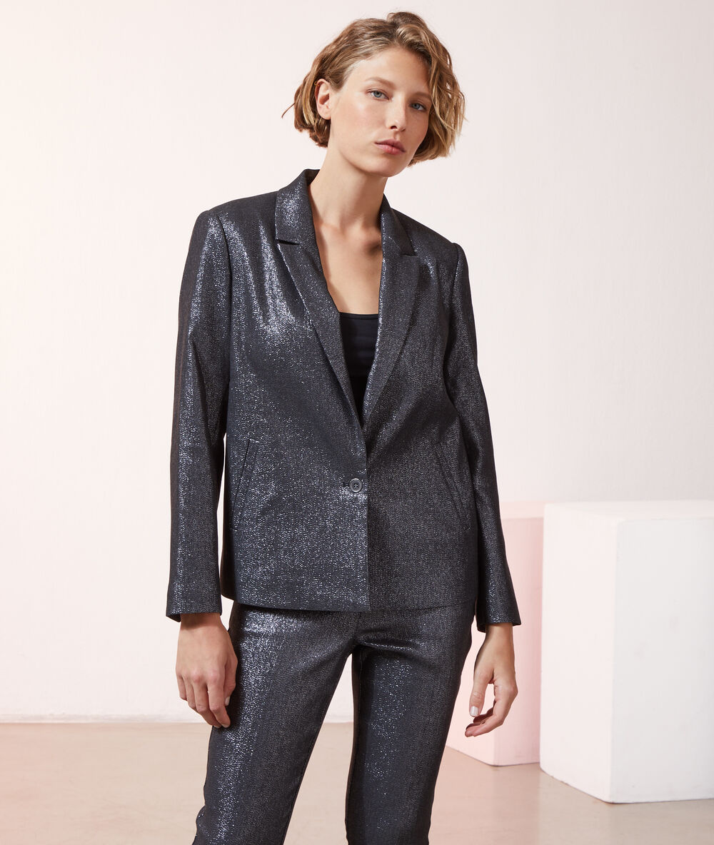 Veste de tailleur pailleté noir.