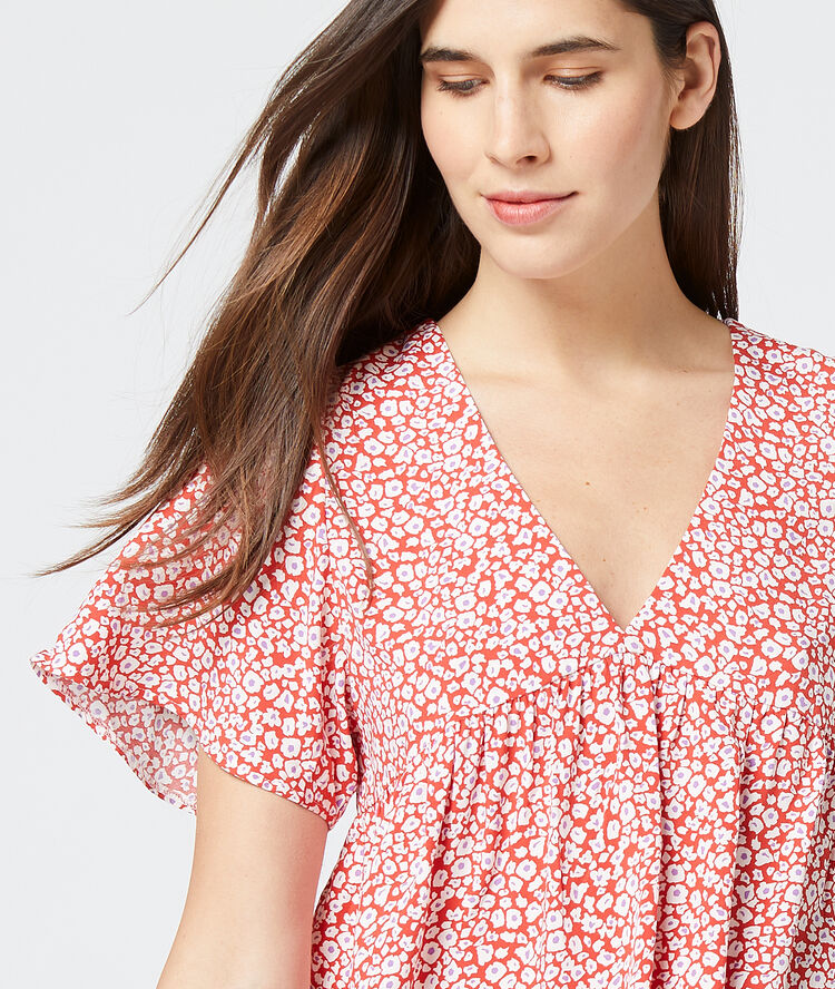 Blouse à imprimé fleuri carmin.