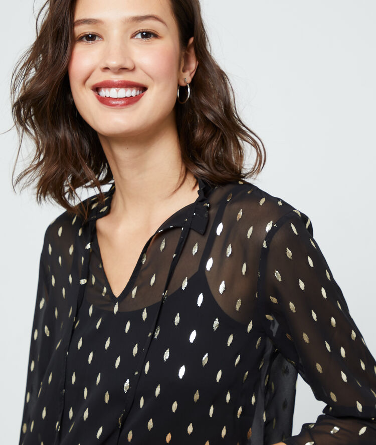 Blouse doublée à motifs plumes noir.