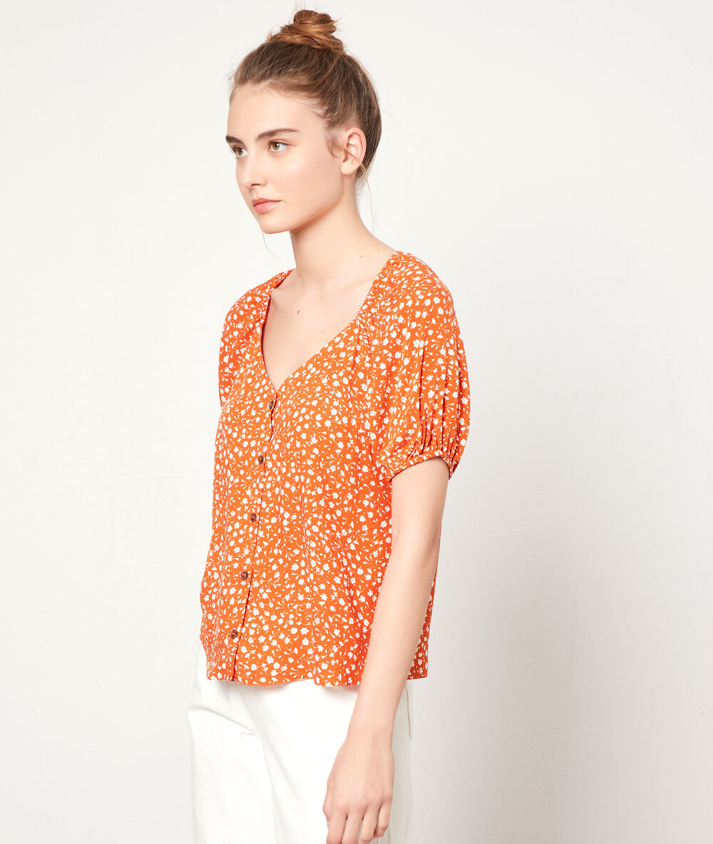Top imprimé fleuri tangerine.
