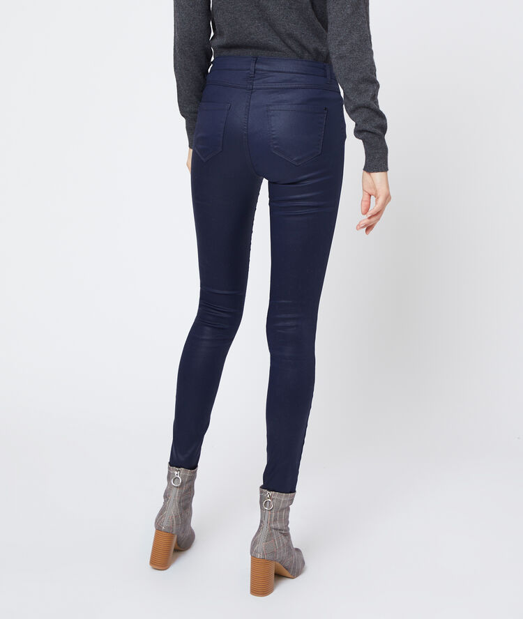 Jean slim enduit marine.