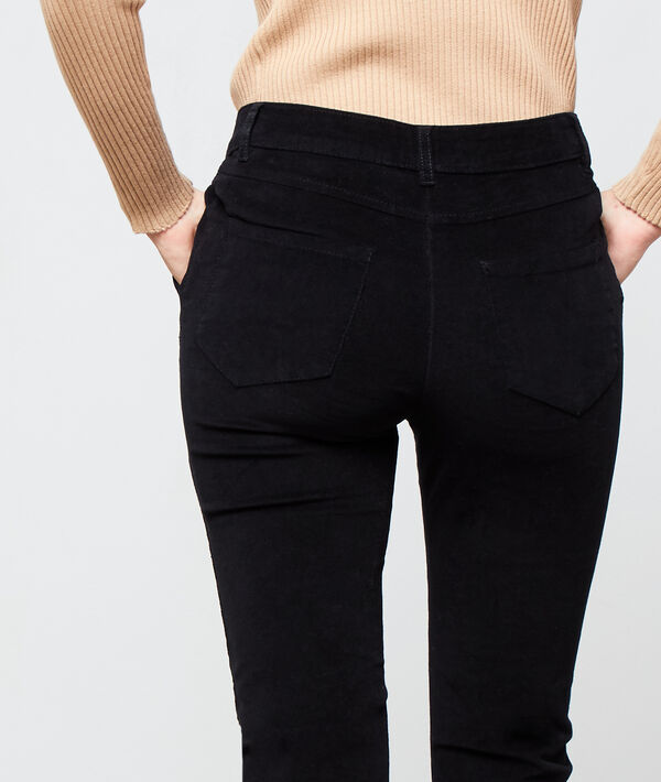 Pantalon slim en velours noir.