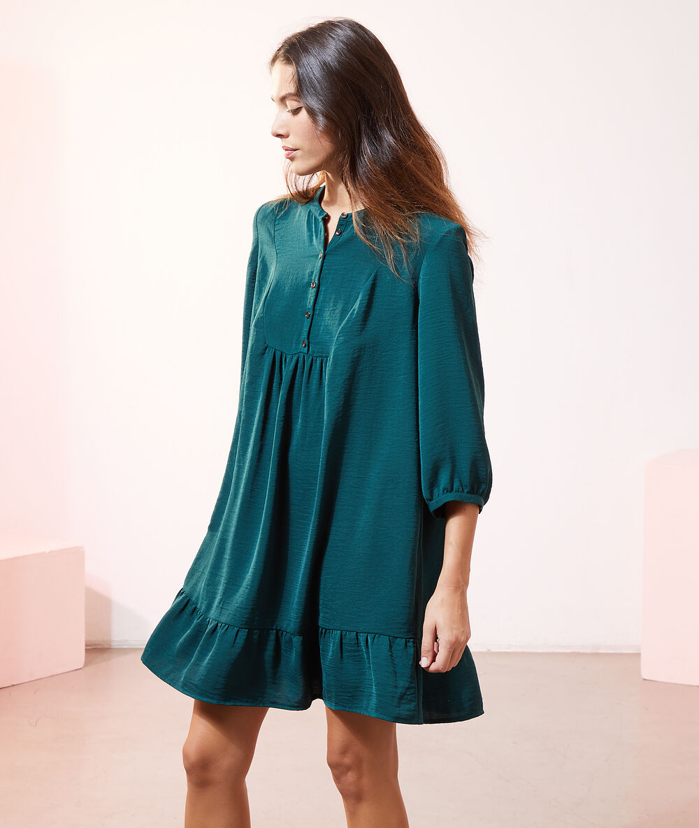 Robe boutonnée vert paon.