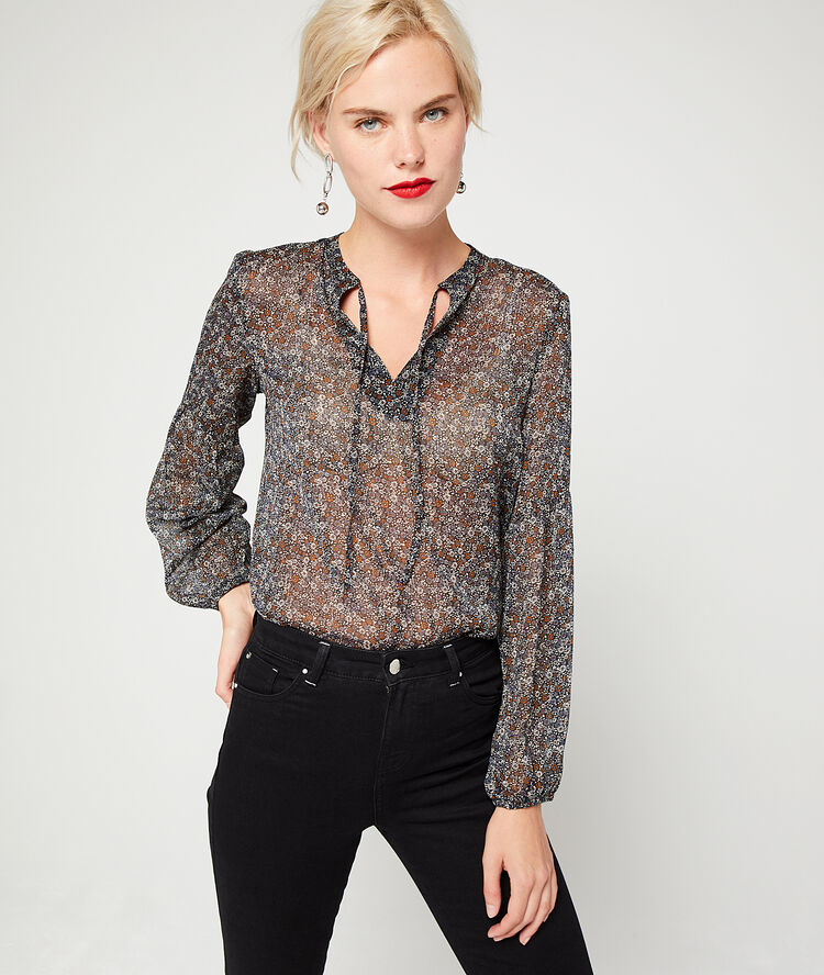 Blouse fleurie effet transparent marine.