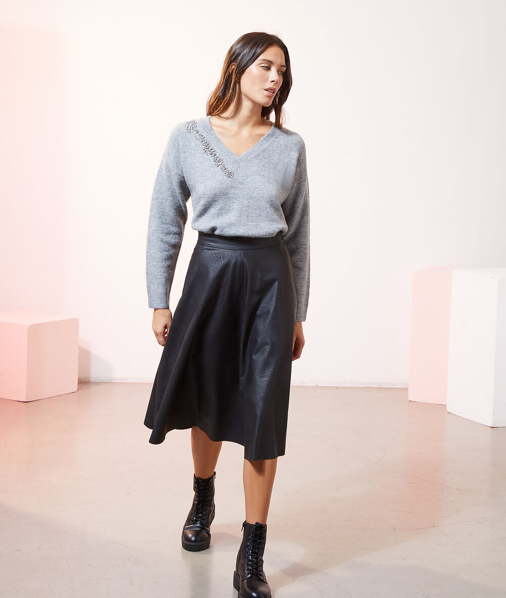Jupe midi effet cuir noir.