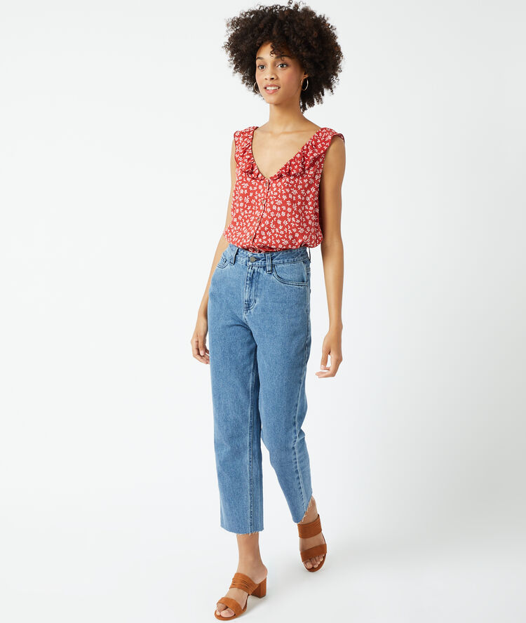 Blouse imprimée à volants brique.