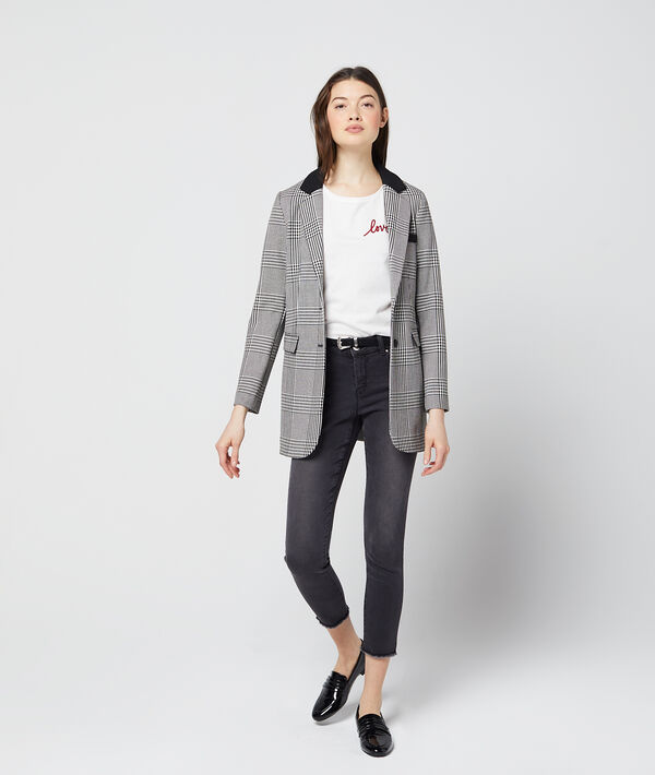 Veste de tailleur à carreaux noir.