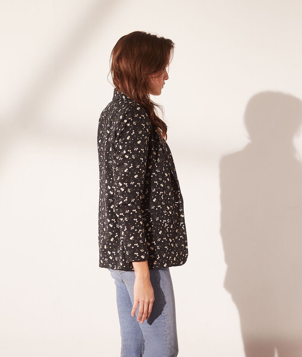Veste de tailleur imprimé fleuri noir.