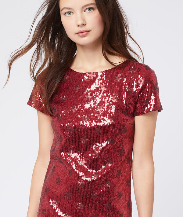 Robe longue à sequins rouge.