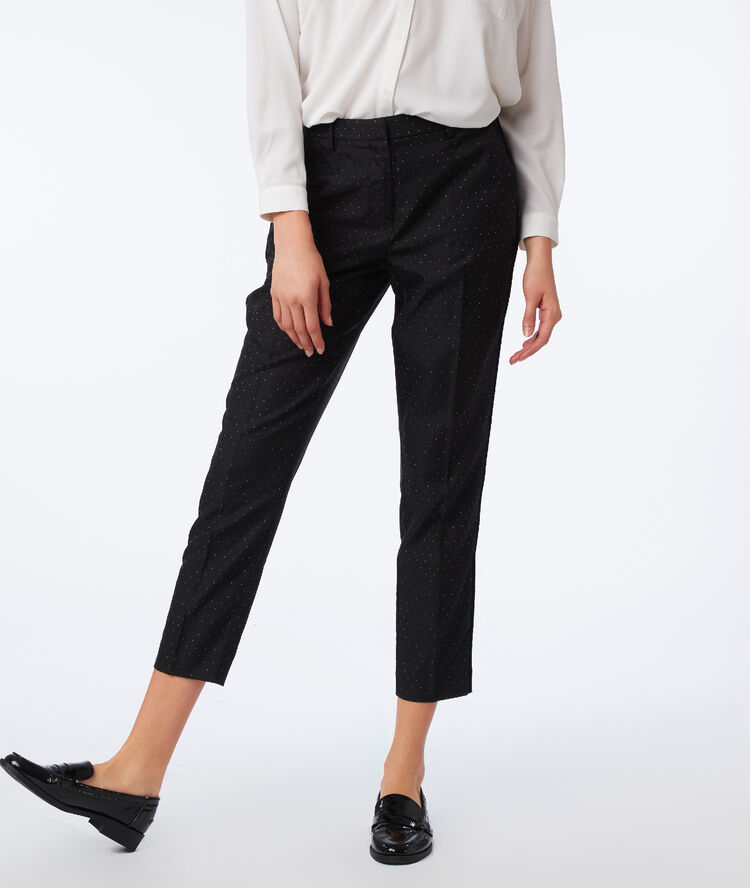 Pantalon cigarette à pois noir.