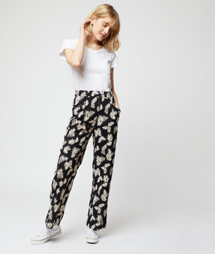 Pantalon large imprimé feuillage noir.