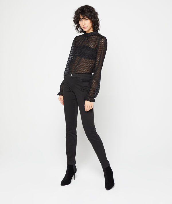 Pantalon slim en coton noir.