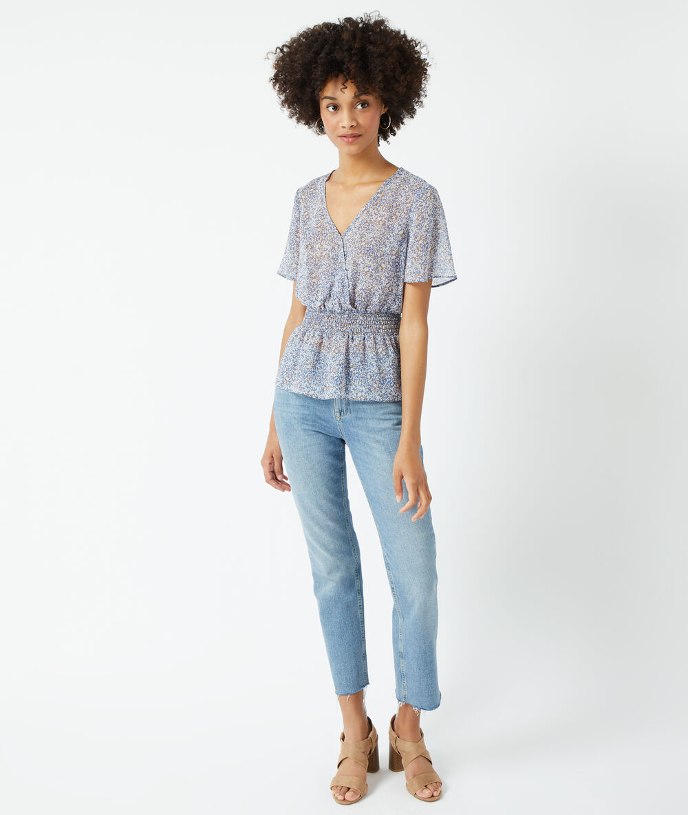 Blouse smockée imprimé fleuri ciel.