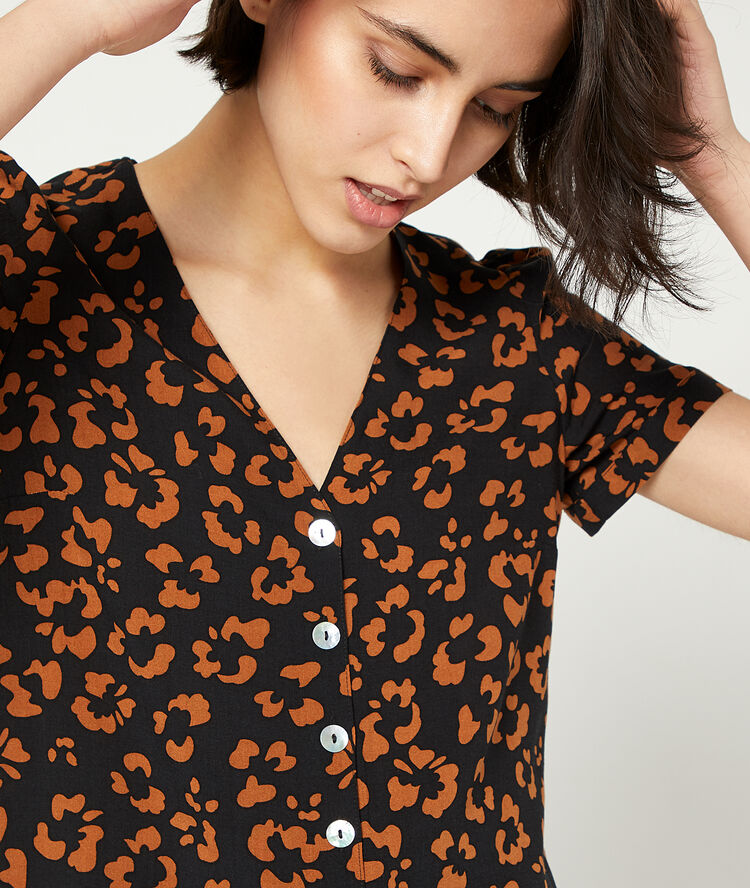 Blouse à imprimé fleuri noir.
