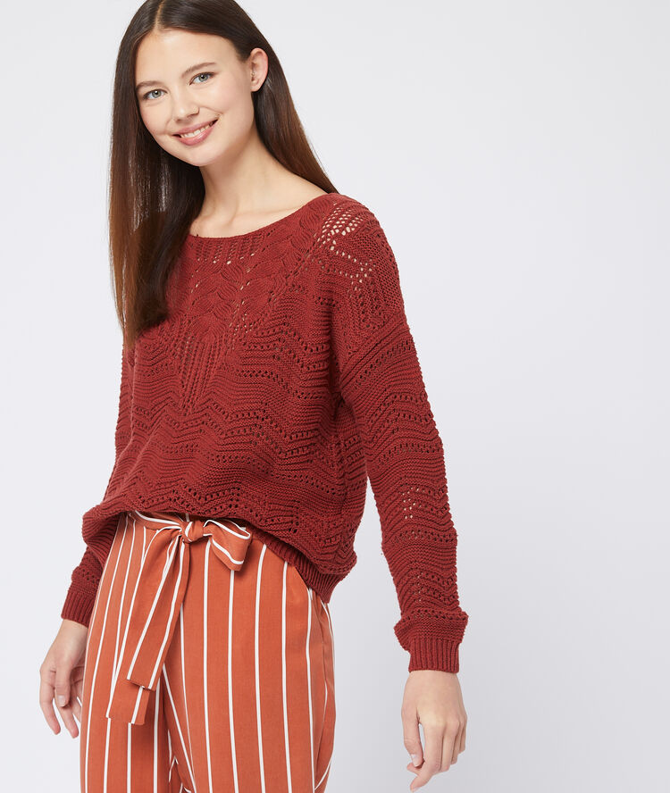 Pull en grosse maille torsadée rouille.