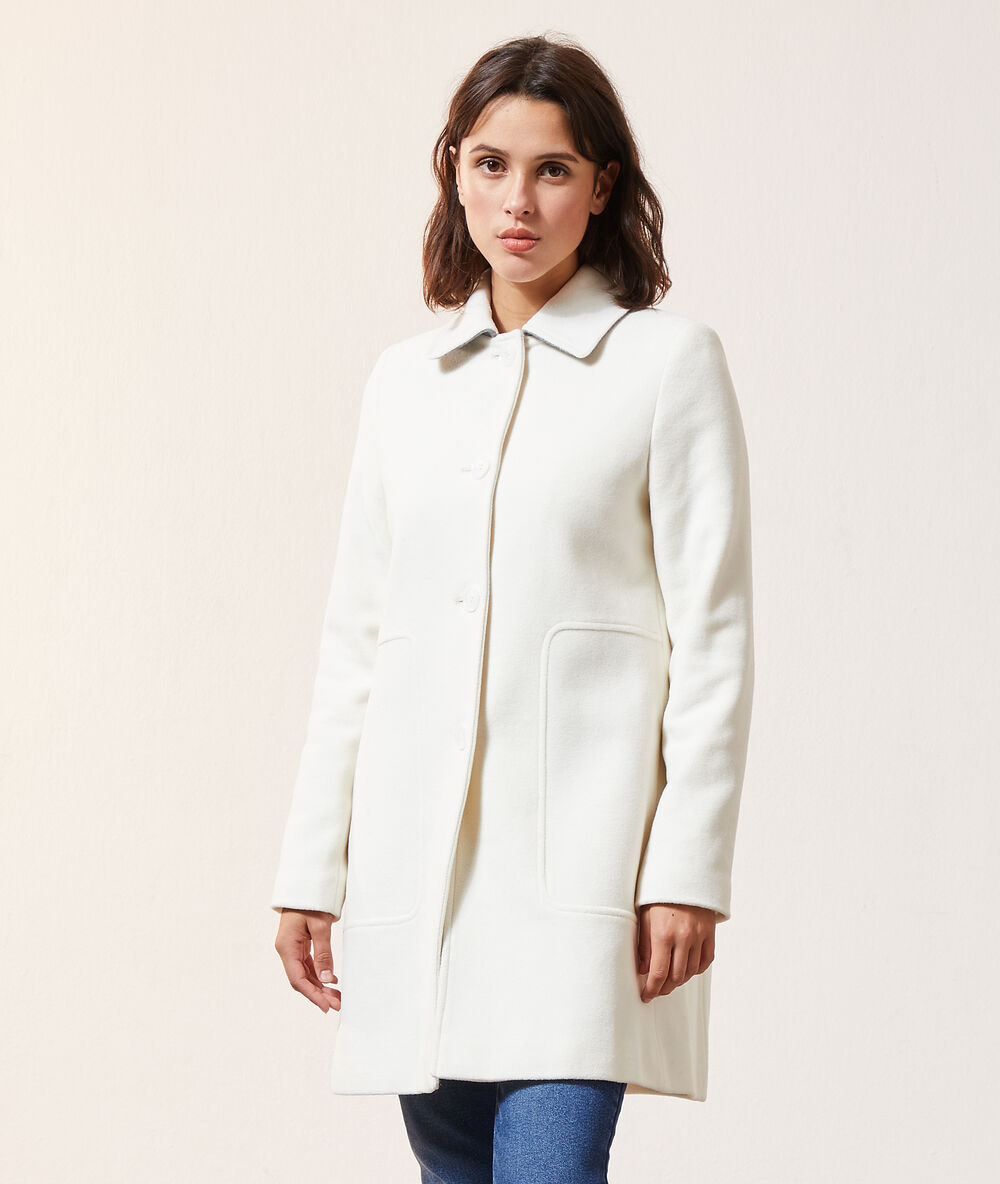 Manteau droit en laine mélangée avec col blanc.