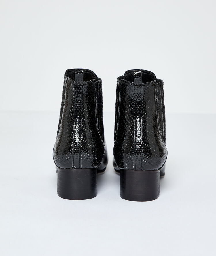 Bottines effet serpent noir.