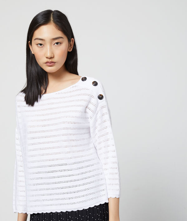 Pull en maille ajourée blanc.