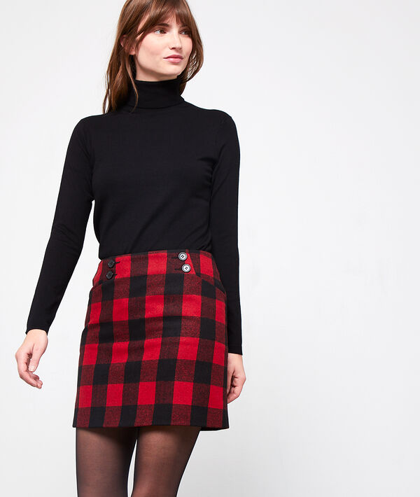 Pull à col roulé noir.
