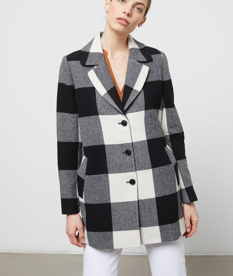 Manteau droit à gros carreaux noir.