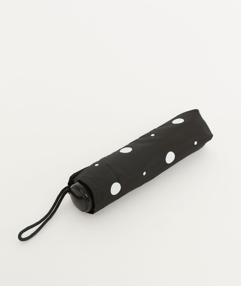 Parapluie à pois noir.