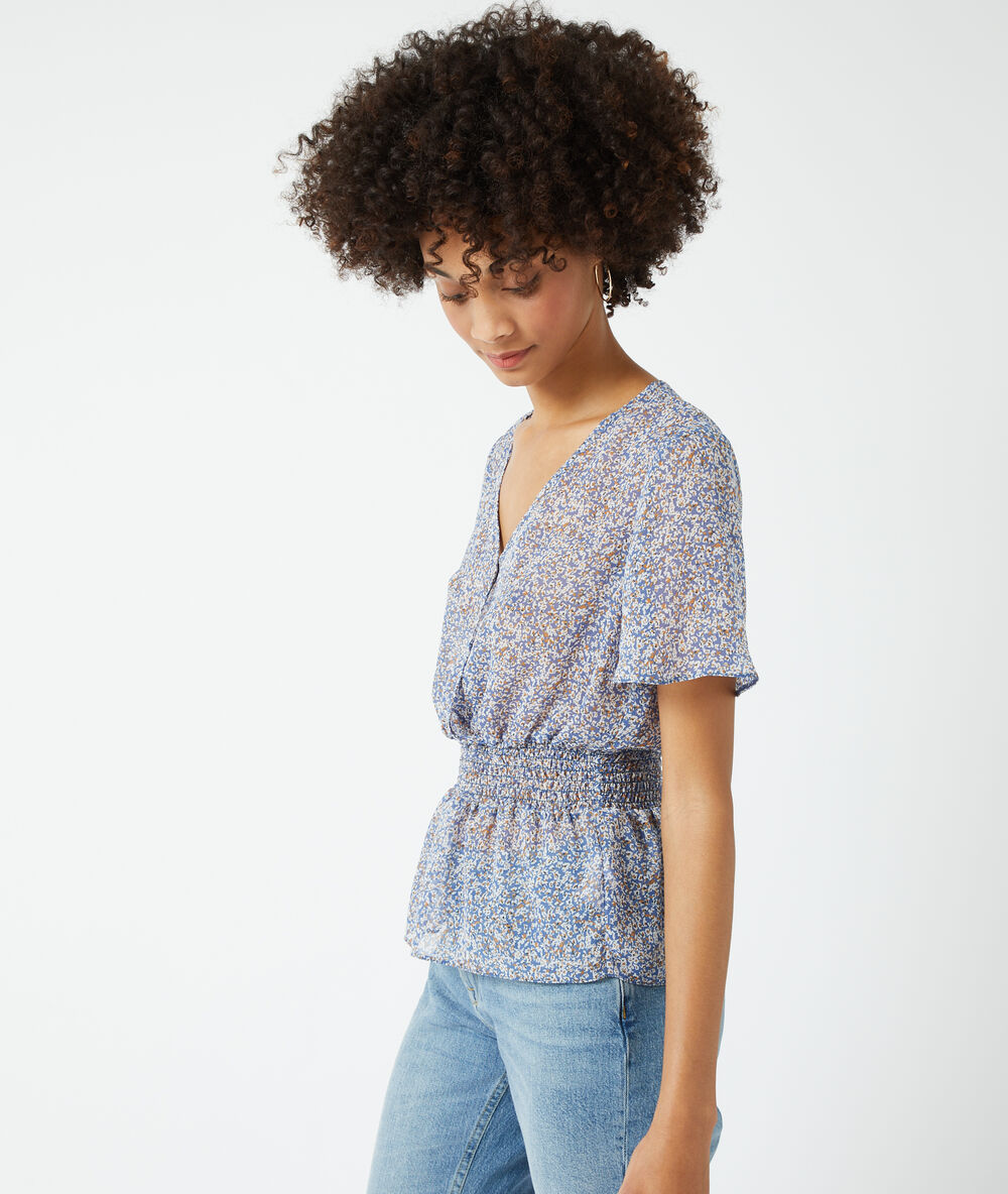 Blouse smockée imprimé fleuri ciel.