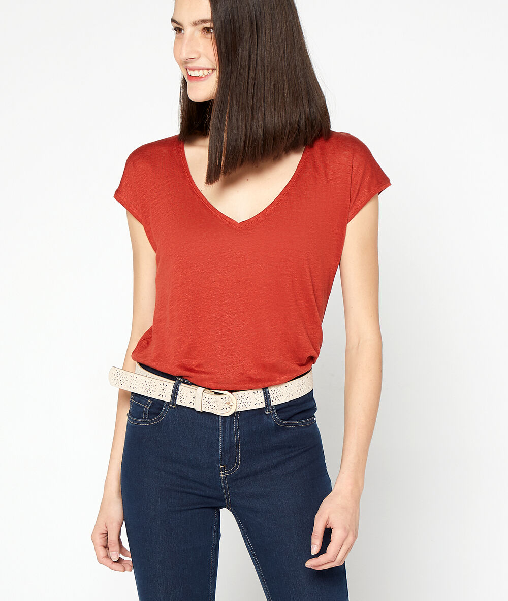 Ceinture perforée en croûte de cuir blush.