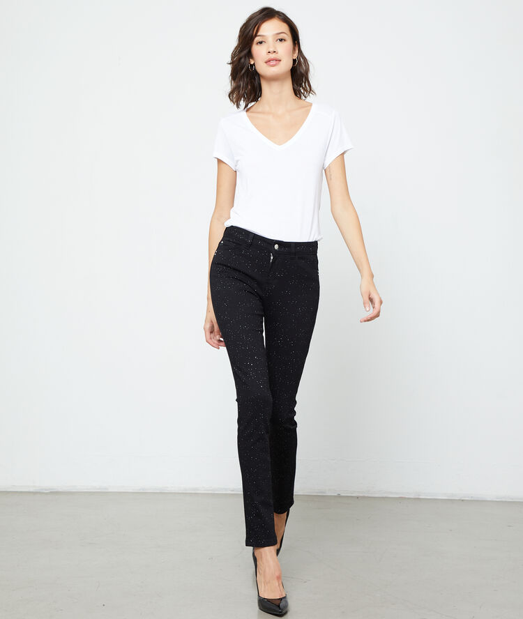 Jean slim à pois noir.