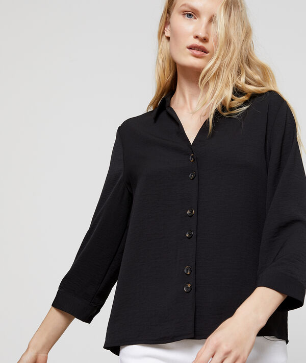 Blouse à col chemisier et boutons Blouse à col chemisier et boutons