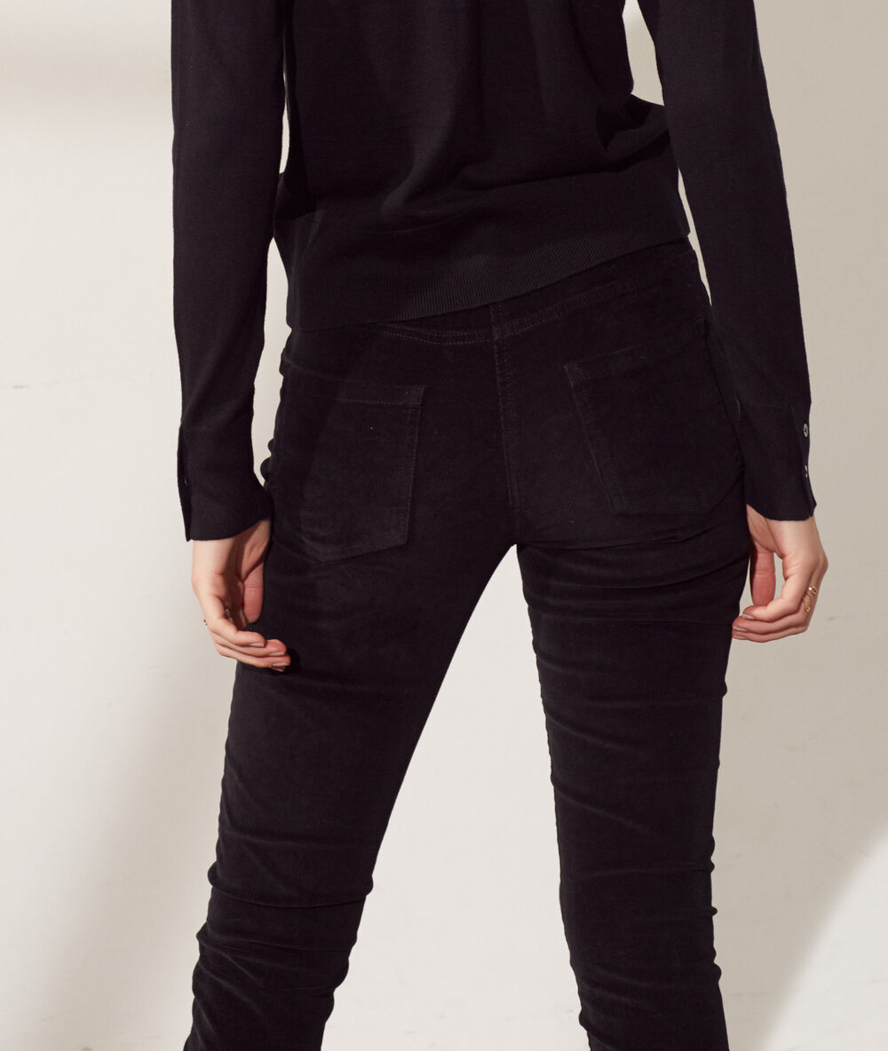 Pantalon en velours slim noir.
