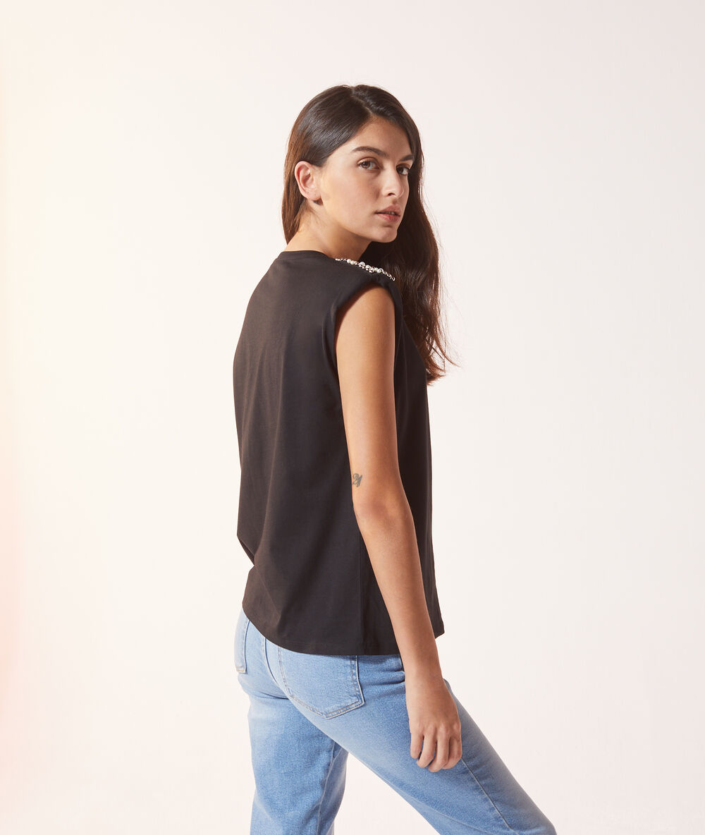 T-shirt à perles avec épaulettes noir.