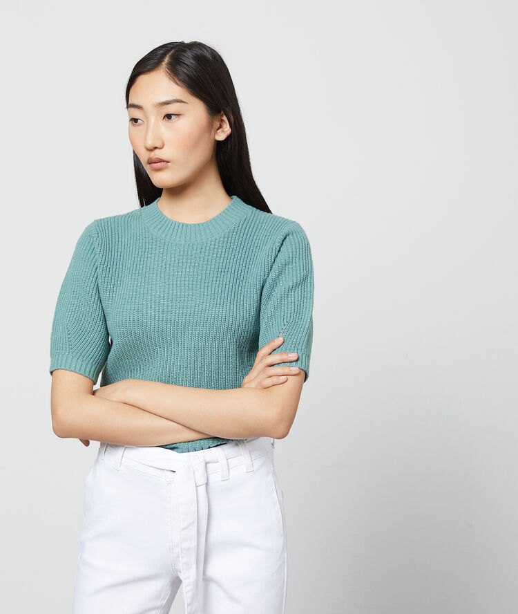 Pull côtelé en grosse maille celadon.