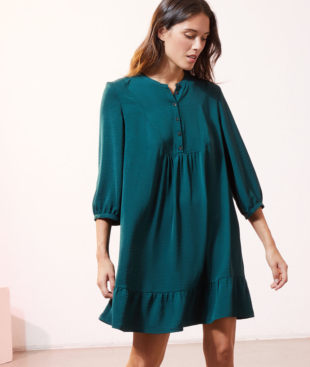Robe boutonnée vert paon.