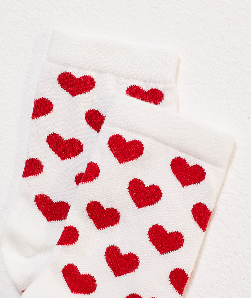 Chaussettes cœurs blanc.