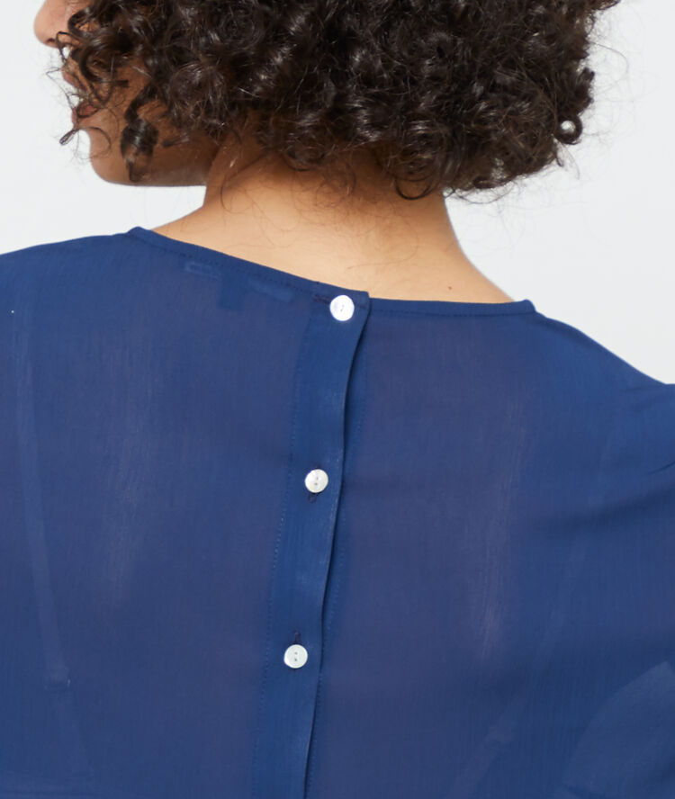Blouse boutonnée au dos marine.