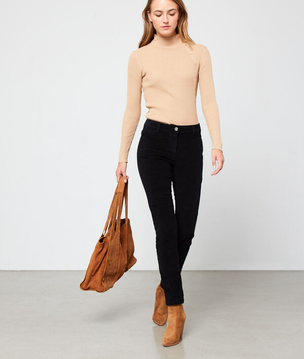 Pantalon slim en velours noir.