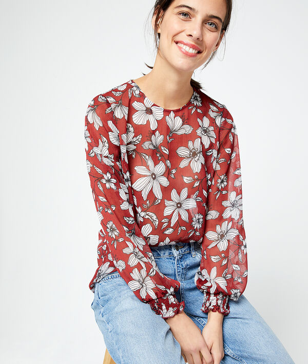 Blouse fleurie effet transparent rouille.