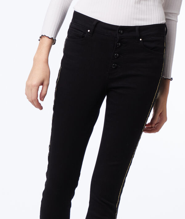 Jean skinny à bandes contrastrées noir.