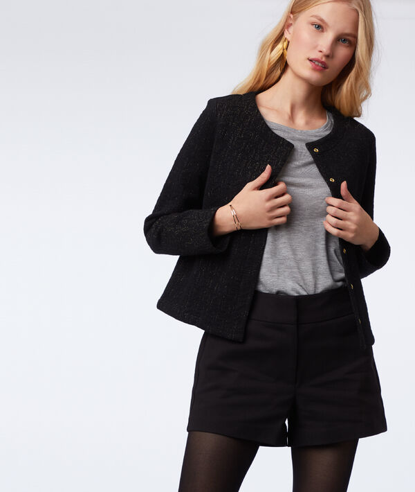 Veste à fils métallisés noir.