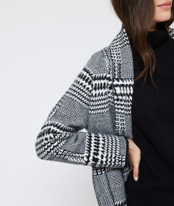 Gilet long à motifs jacquard noir.