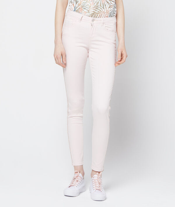 Pantalon slim à bords métallisés nude.