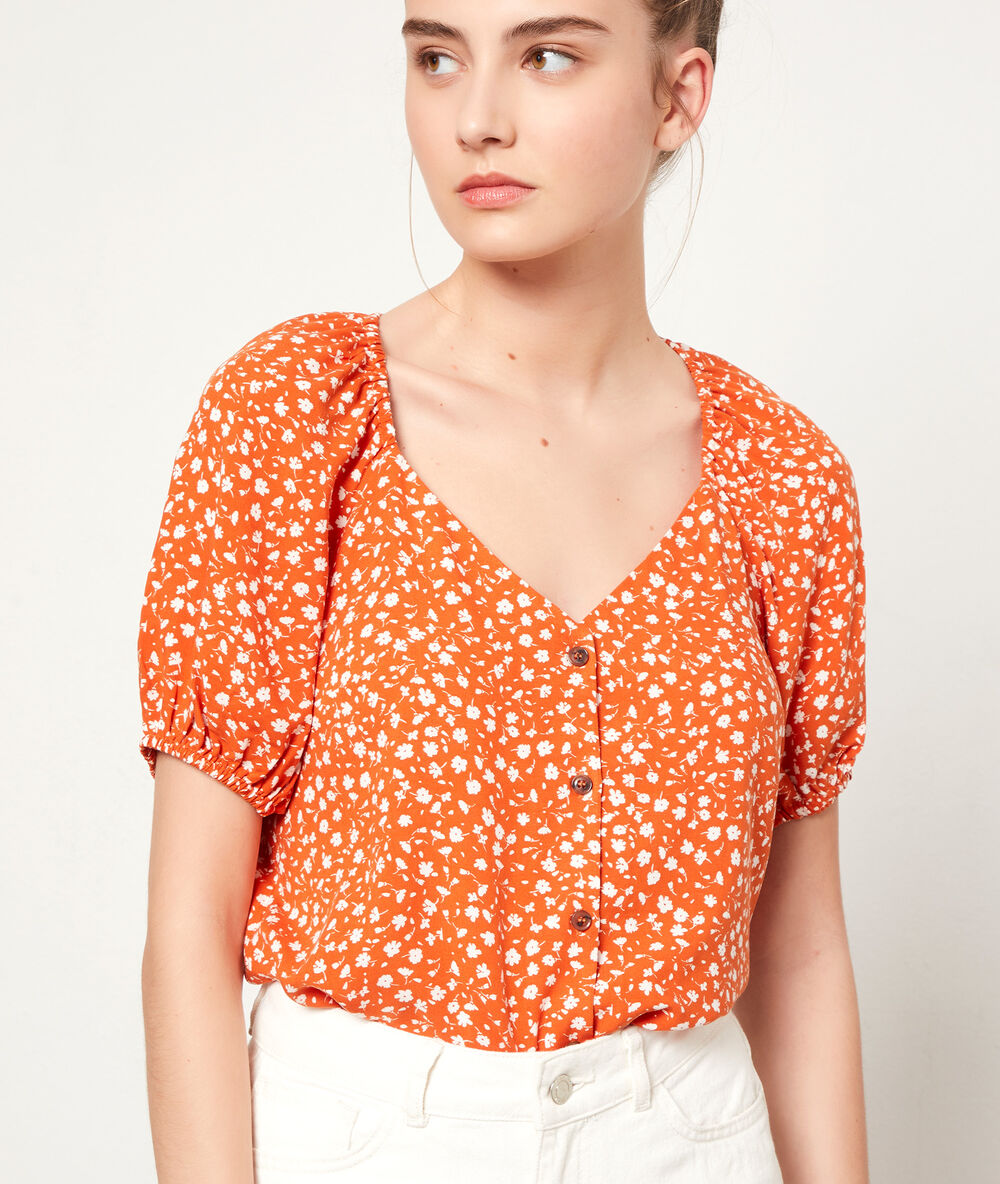 Top imprimé fleuri tangerine.