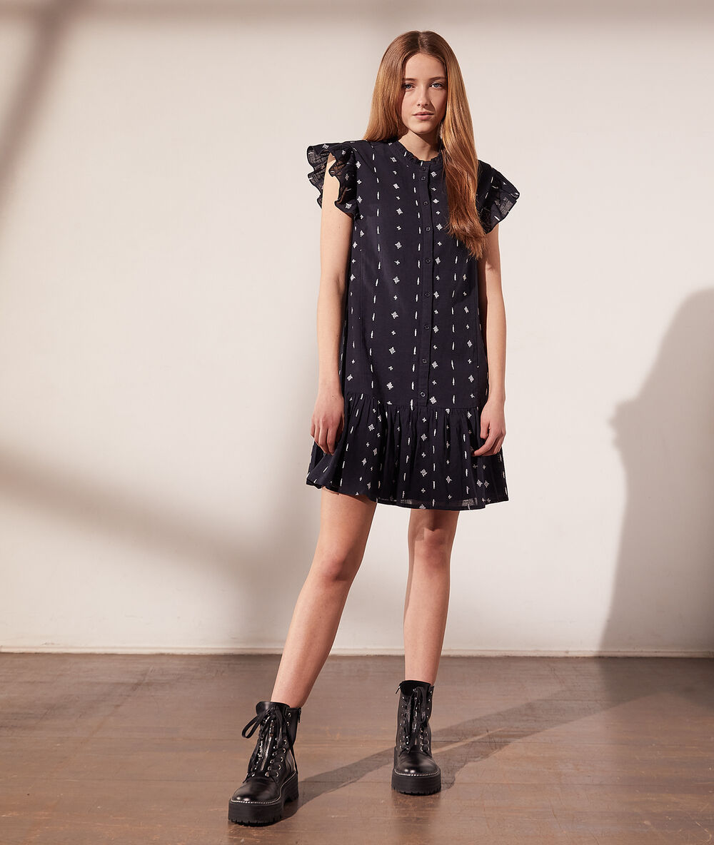 Robe chemise à motifs brodés bleu marine.