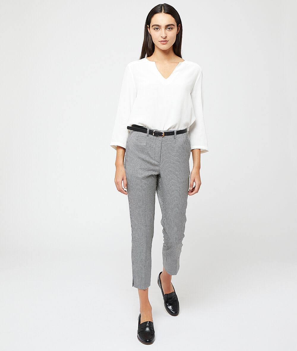Pantalon ceinturé motifs pied de poule noir.