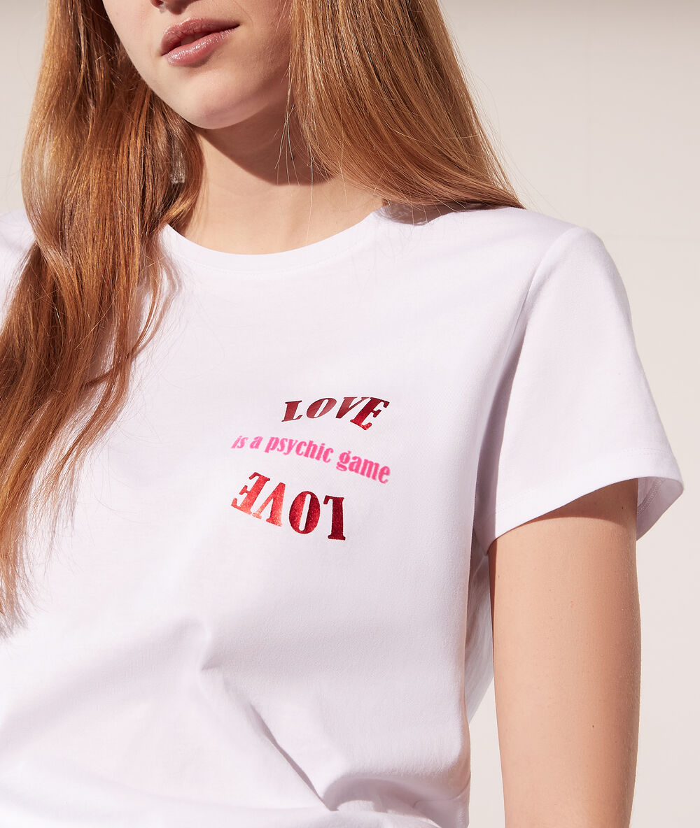 T-shirt "love is a psychic game" blanc.