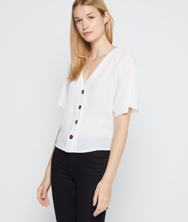 Blouse col v à boutons ecru.