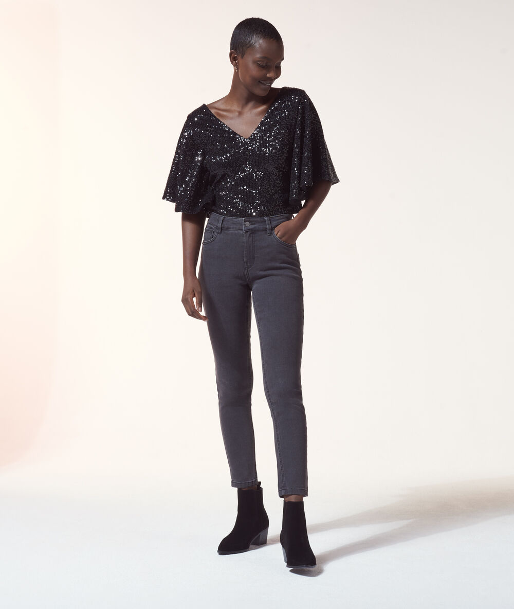 Body en sequins manches chauve-souris noir.