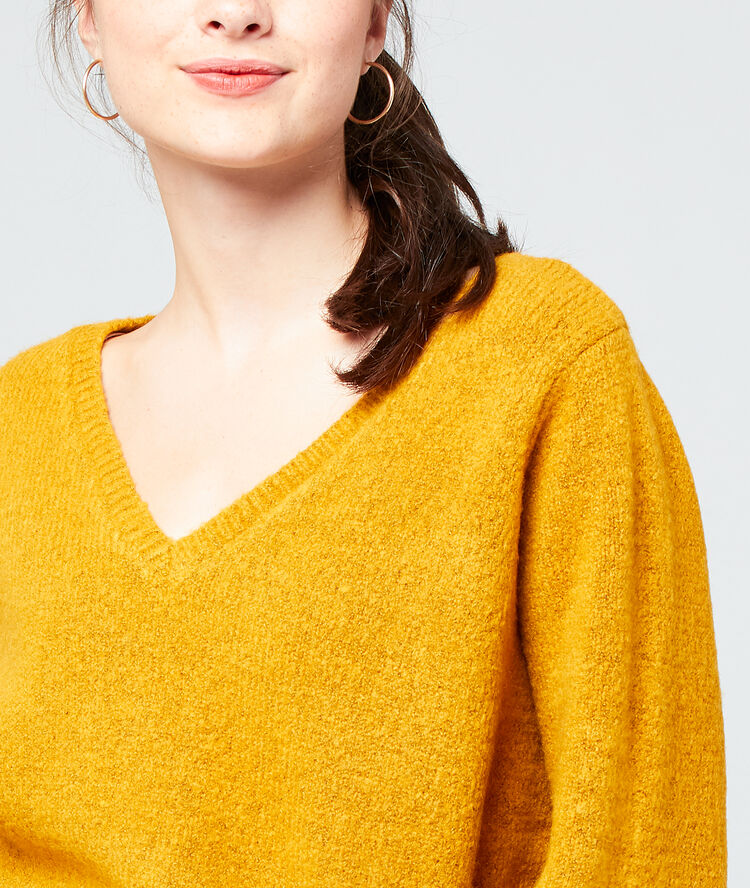 Pull col v ocre.