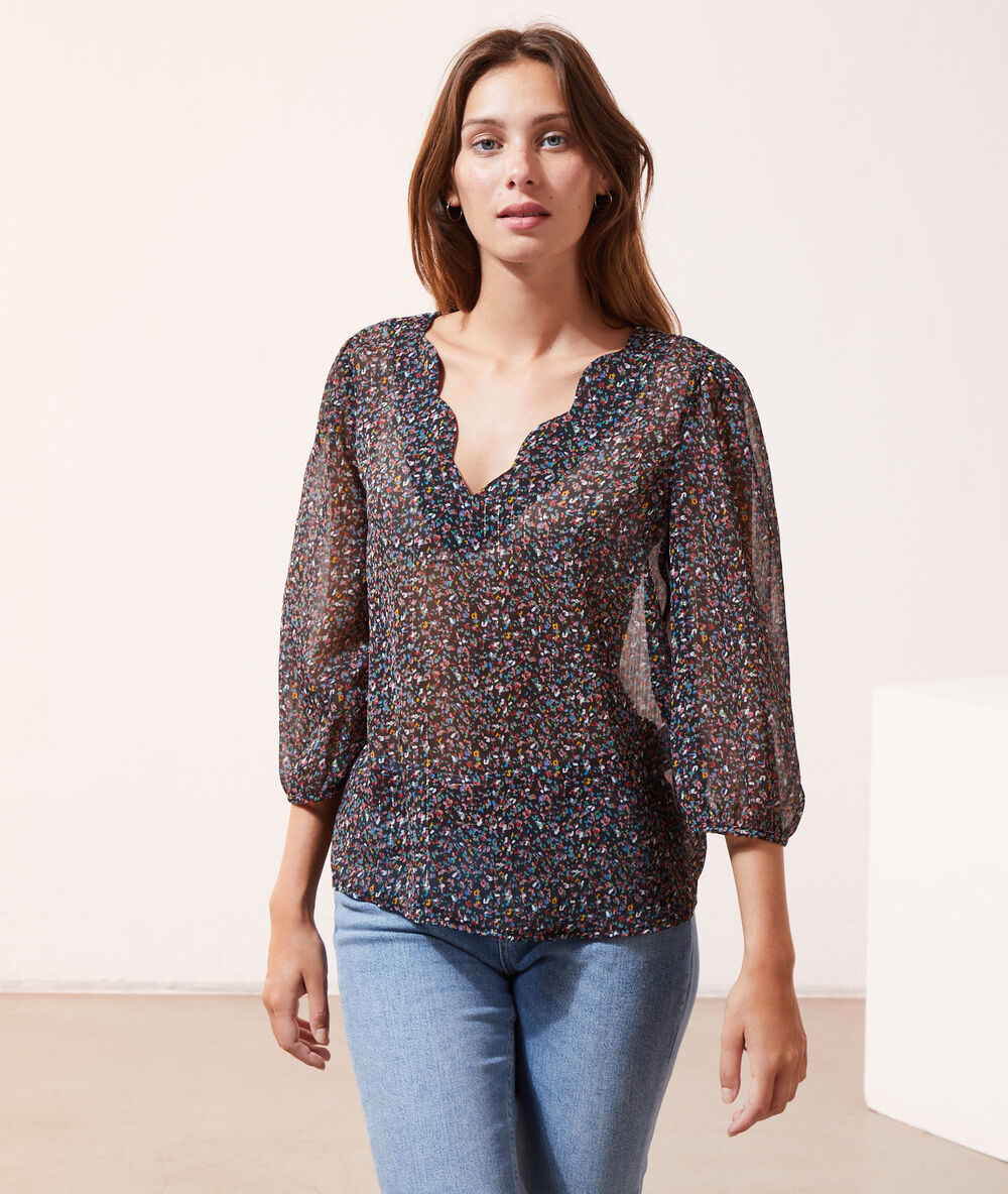 Blouse imprimé fleuri noir.